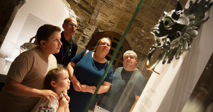 Family admiring a piece in Open Treasure at Durham Cathedral